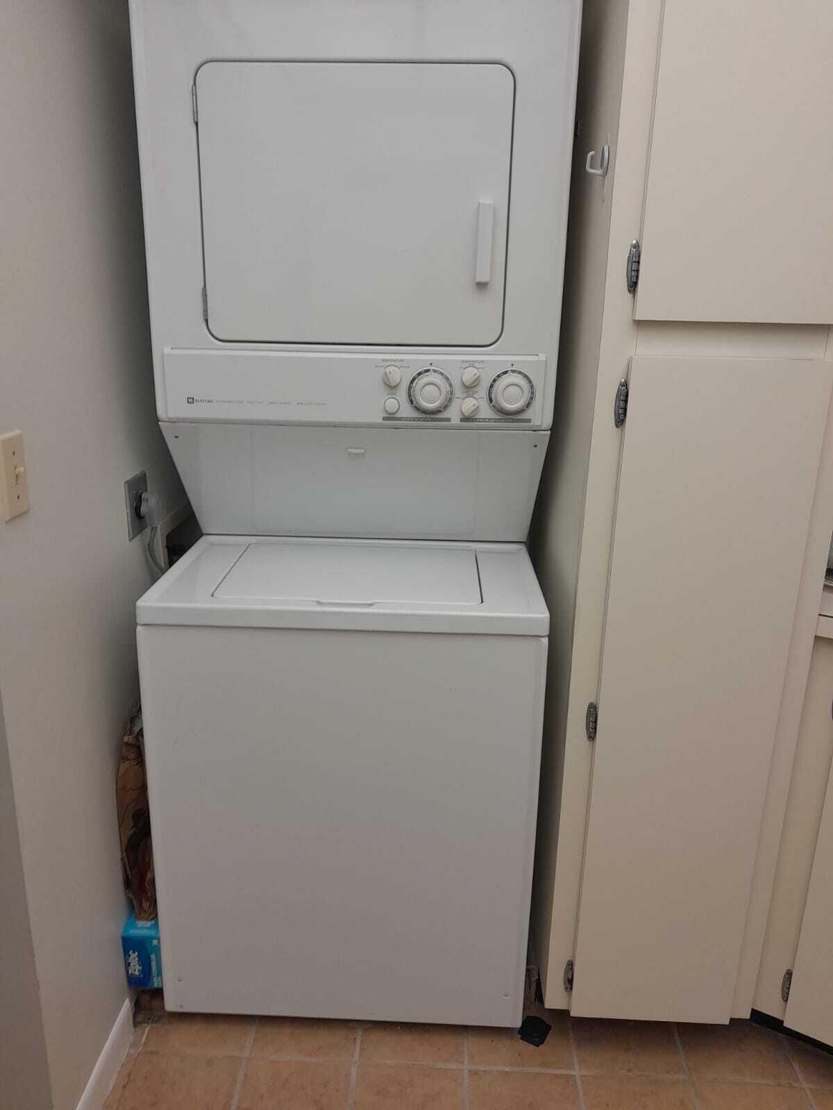 1605 Highway 1, Unit C302 Jupiter, FL 33477 - Photo 15 of 30 a utility room with dryer and washer