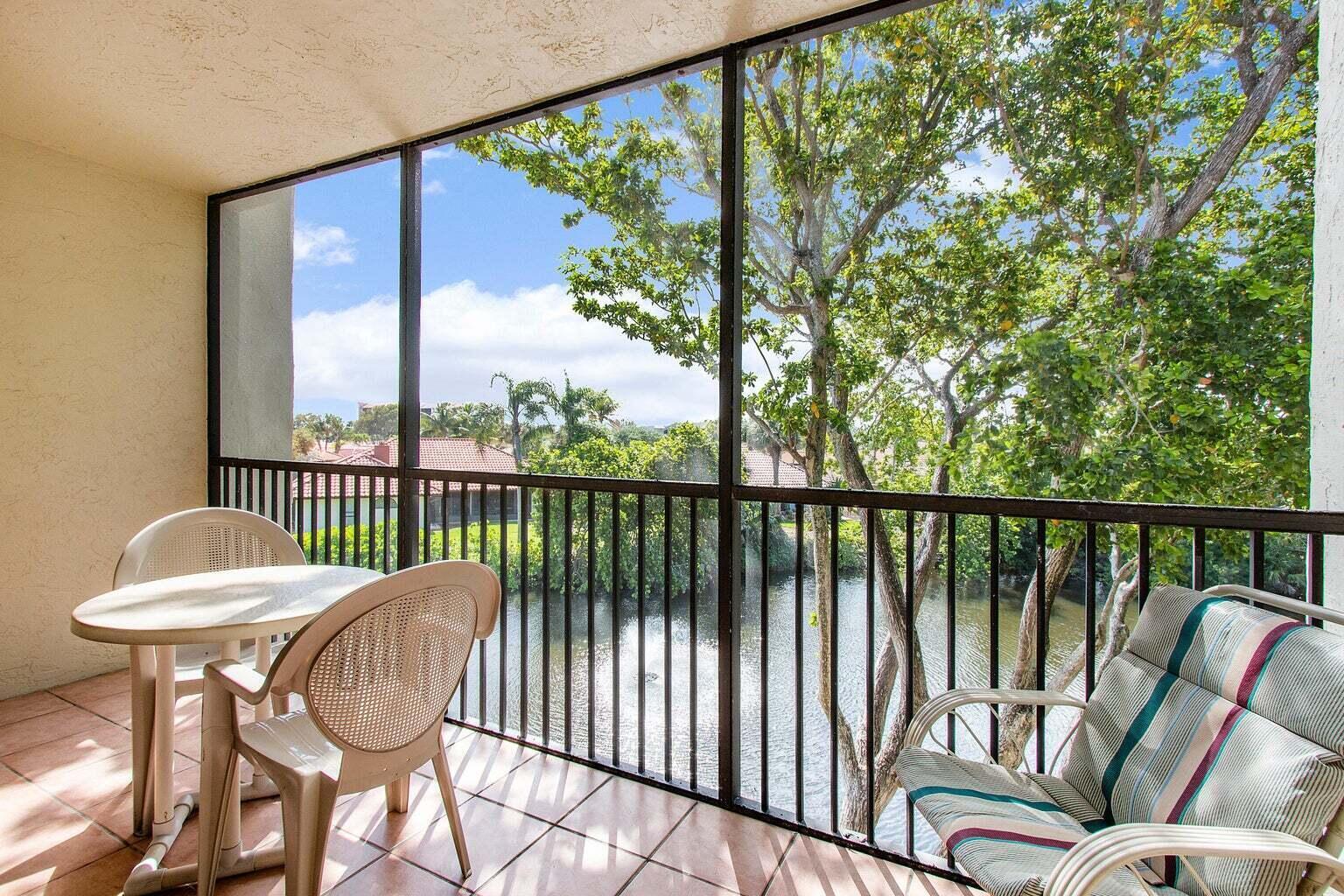 1605 Highway 1, Unit C302 Jupiter, FL 33477 - Photo 21 of 30 a view of a chairs in balcony