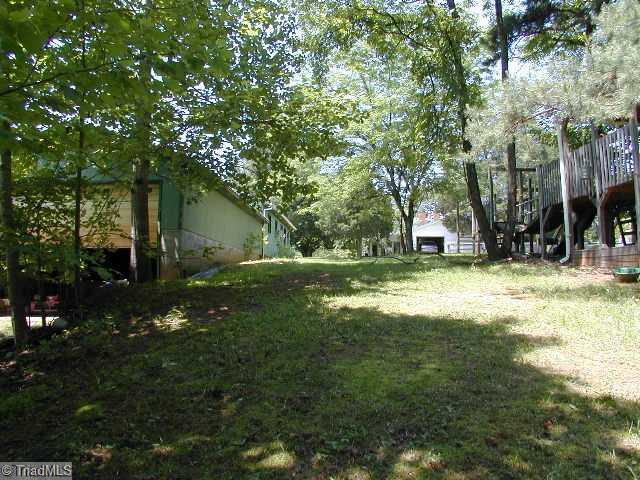 3136 Baltimore Road East Bend, NC 27018 - Photo 14 of 16 Land/Lot. View from rear of Workshop towards back of Home with Large Play Area to the right.