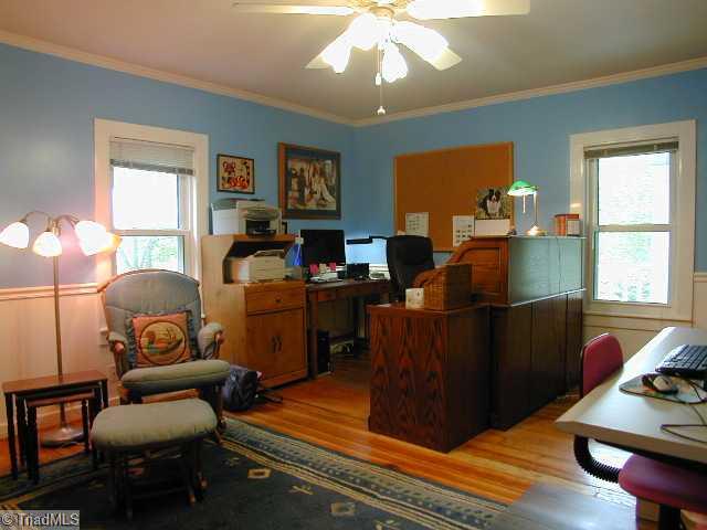 3136 Baltimore Road East Bend, NC 27018 - Photo 8 of 16 2nd Bedroom. Beautiful Pine Floors in right front Bedroom presently being used as an office