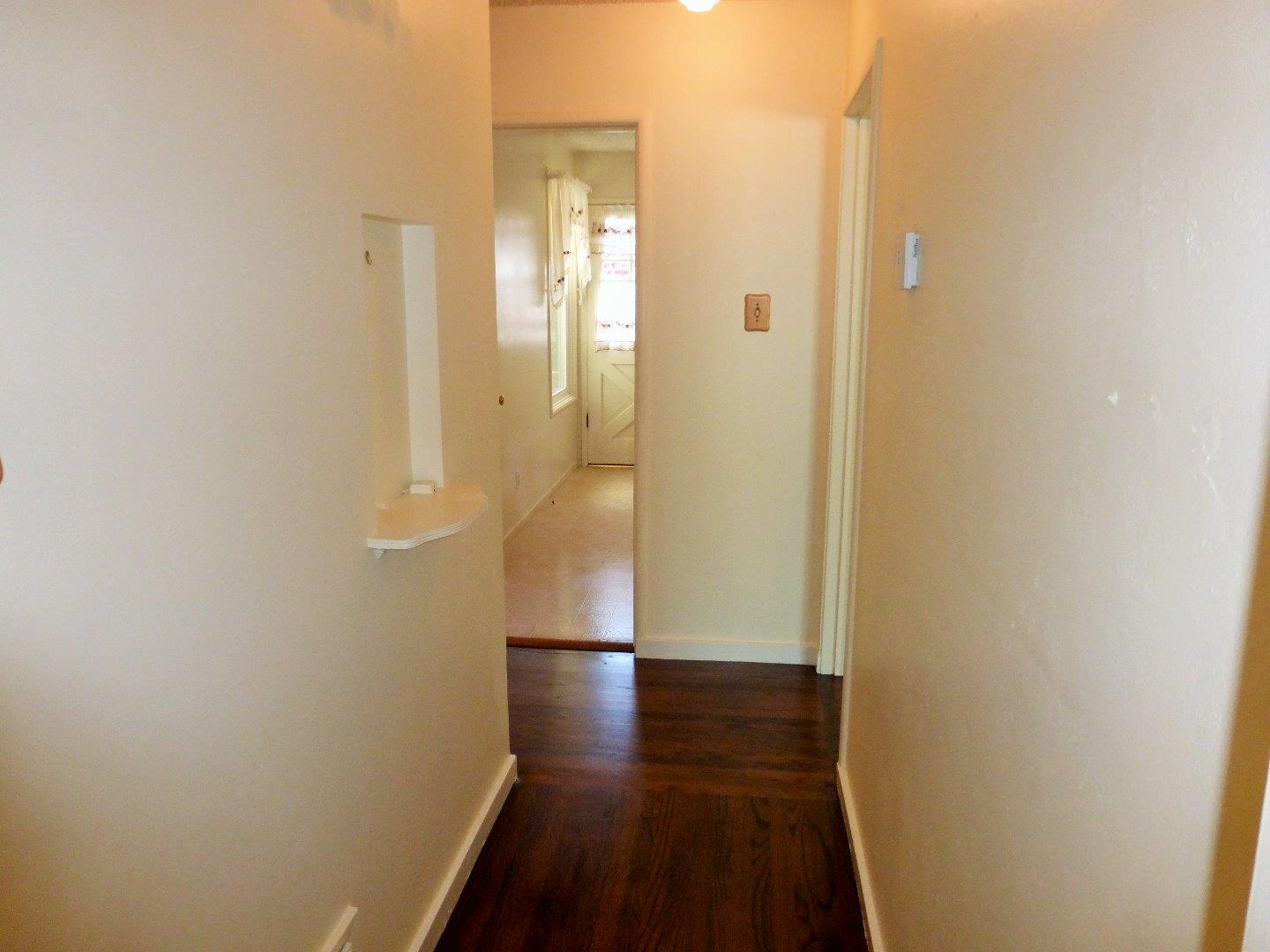 455 Helen Drive Millbrae, CA 94030 - Photo 18 of 29 a view of a hallway with wooden floor