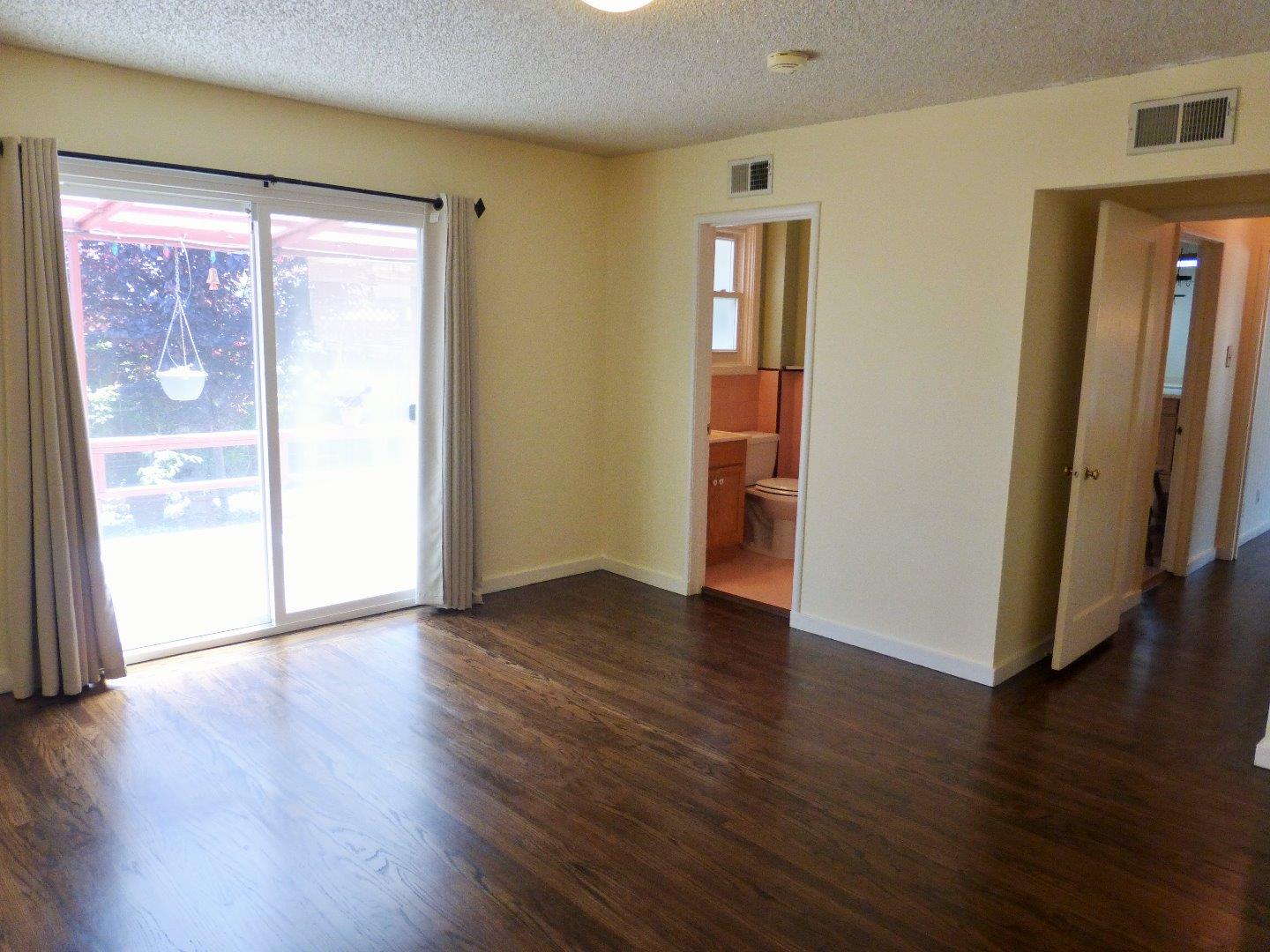 455 Helen Drive Millbrae, CA 94030 - Photo 20 of 29 a view of an empty room with wooden floor and a window