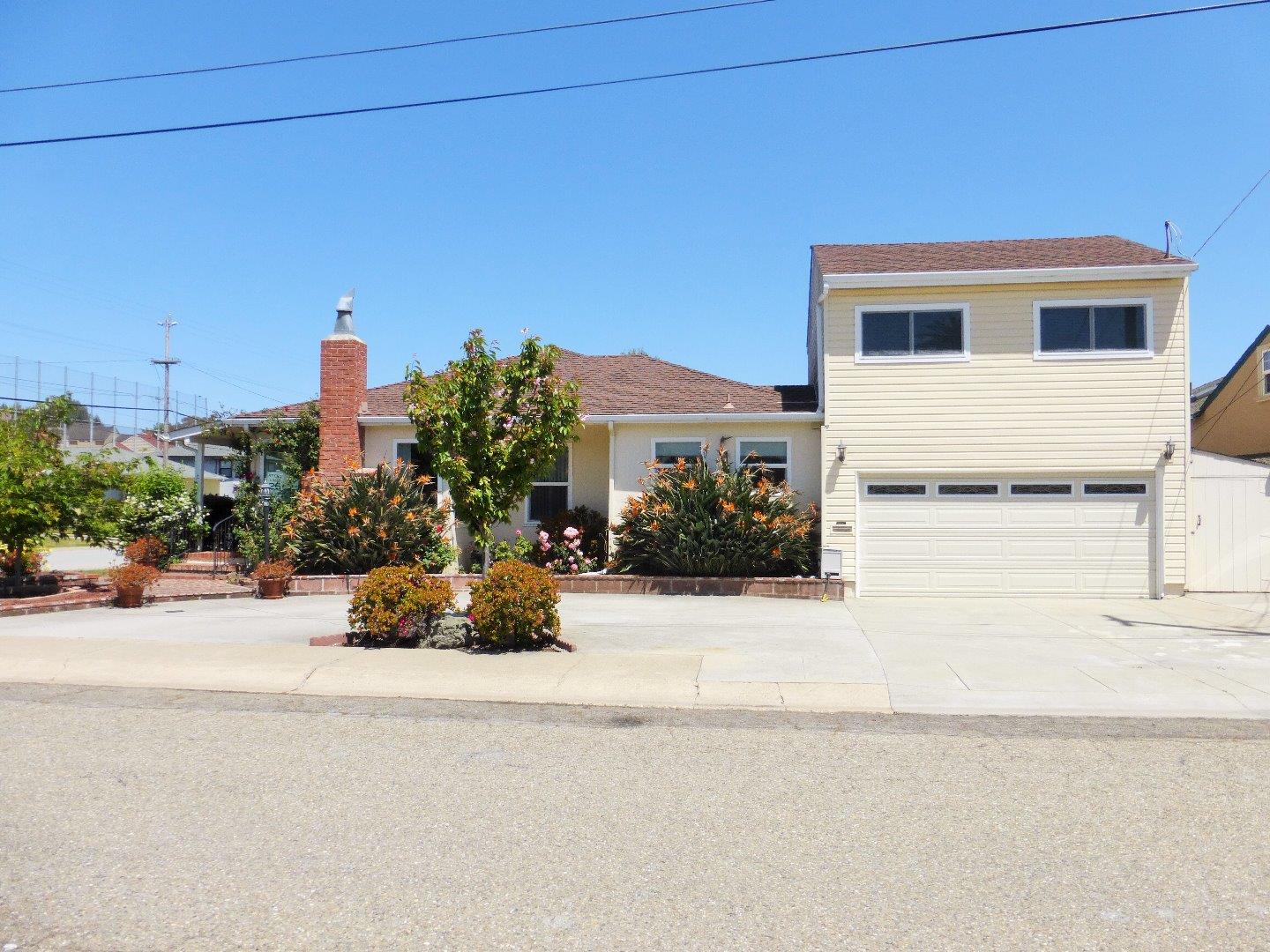 455 Helen Drive Millbrae, CA 94030 - Photo 2 of 29 front view of a house with a street