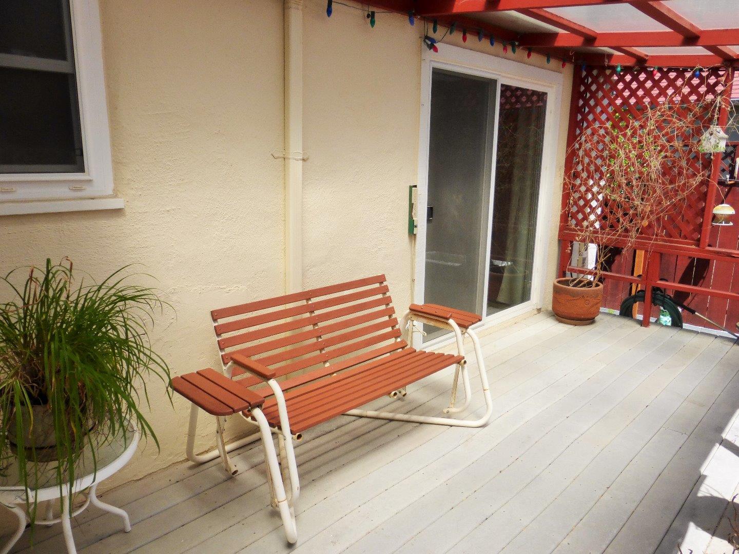 455 Helen Drive Millbrae, CA 94030 - Photo 25 of 29 a backyard of a house with outdoor seating