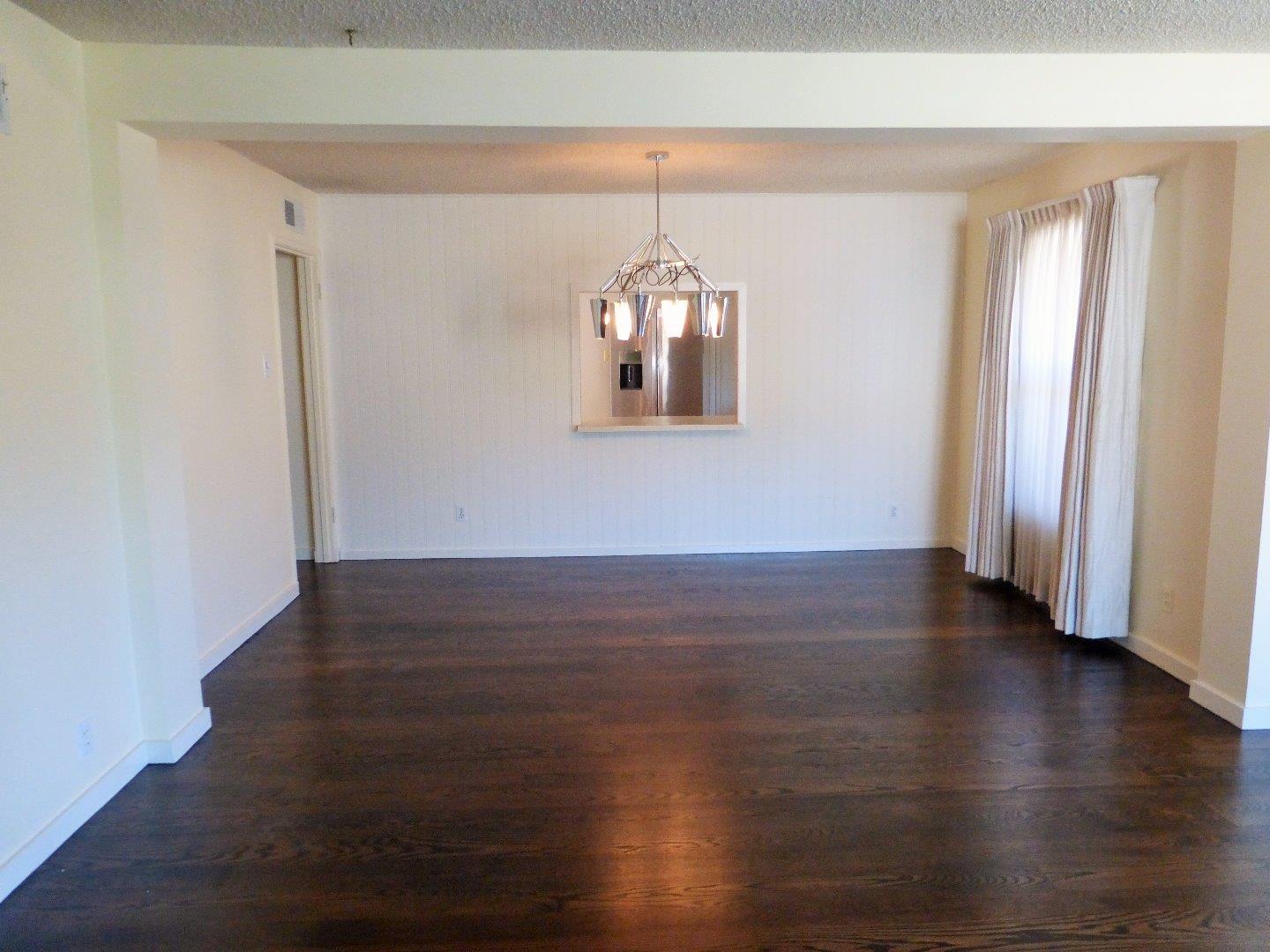 455 Helen Drive Millbrae, CA 94030 - Photo 7 of 29 a view of a room with wooden floor and window