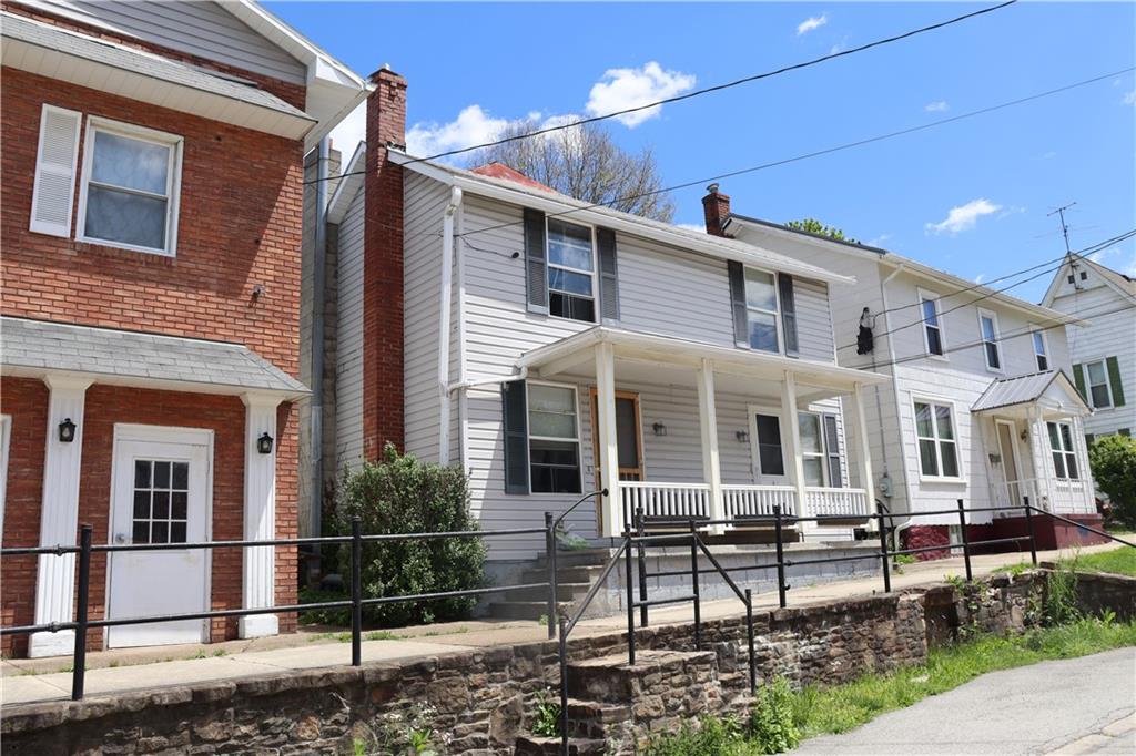 306 East Main Street Ligonier, PA 15658 - Photo 2 of 3 front view of a house with a yard