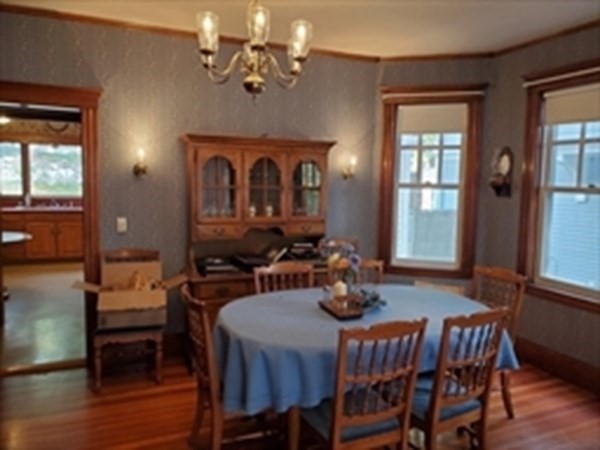 29 Bartlett Crescent Brookline, MA 02446 - Photo 13 of 27 a view of a dining room with furniture window and wooden floor