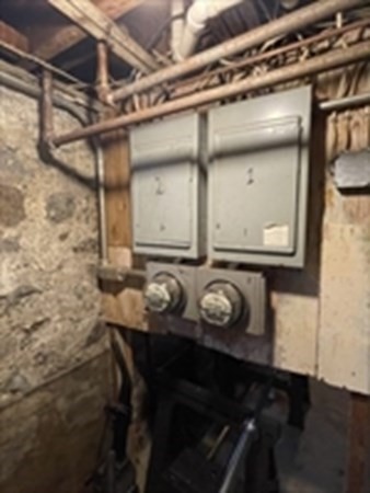 29 Bartlett Crescent Brookline, MA 02446 - Photo 26 of 27 a bathroom with a sink and a mirror