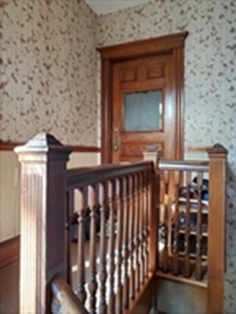 29 Bartlett Crescent Brookline, MA 02446 - Photo 7 of 27 a front view of a house with wooden floor