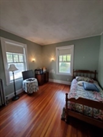 29 Bartlett Crescent Brookline, MA 02446 - Photo 10 of 27 a bedroom with a bed and a window
