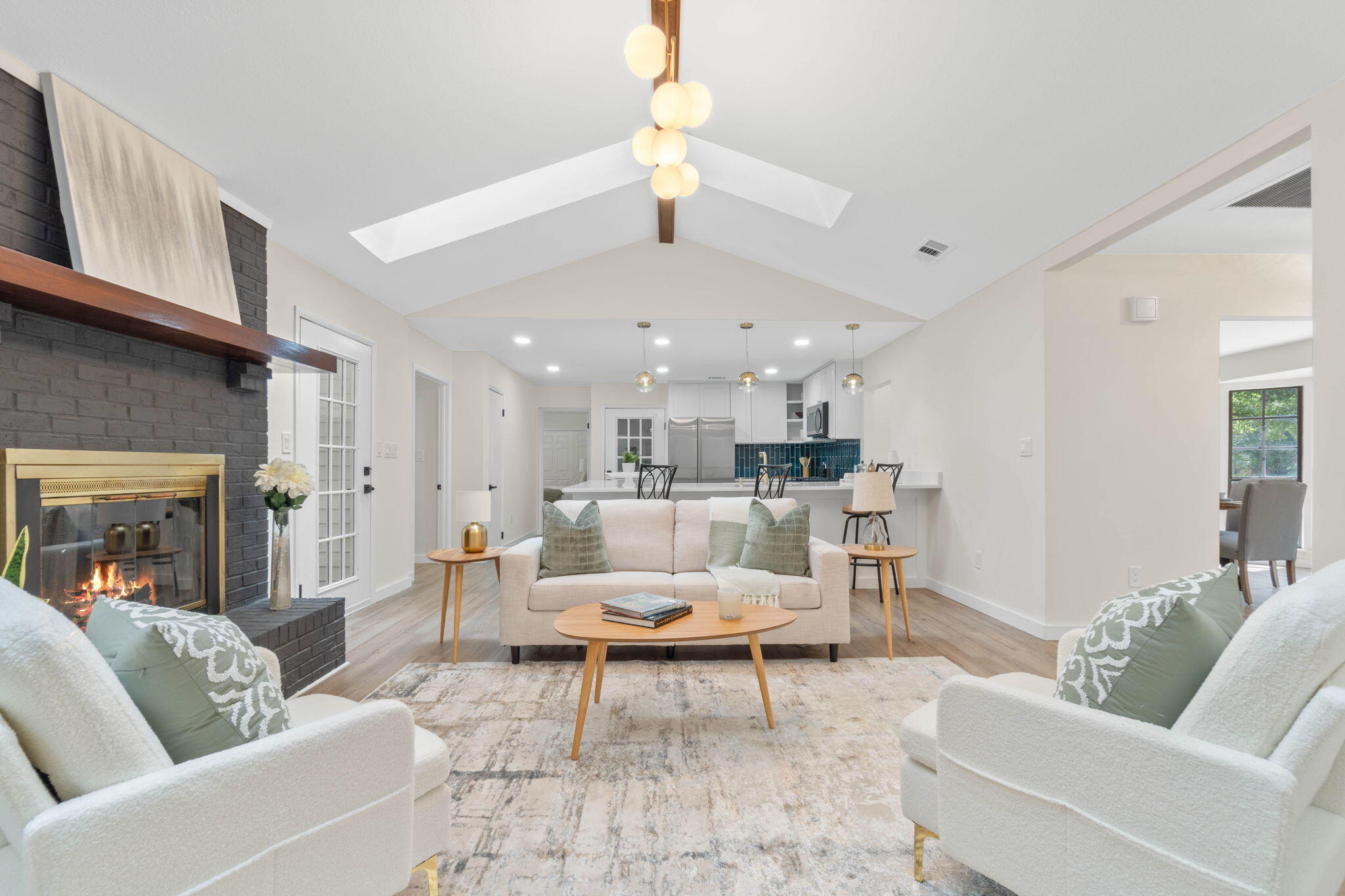 2313 Canal Drive Niceville, FL 32578 - Photo 13 of 52 a living room with furniture and a fireplace
