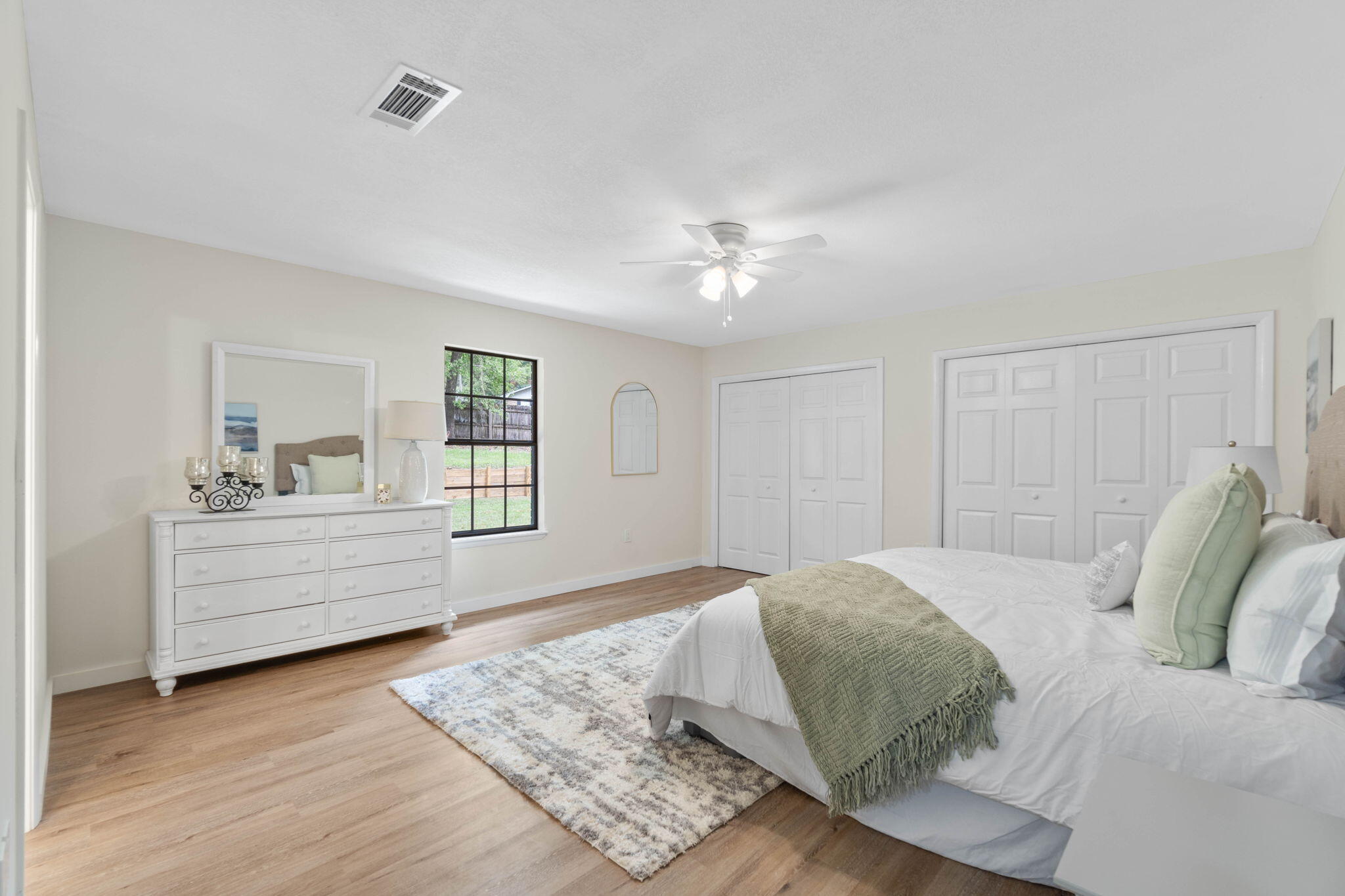2313 Canal Drive Niceville, FL 32578 - Photo 25 of 52 a bed room with a bed and a window