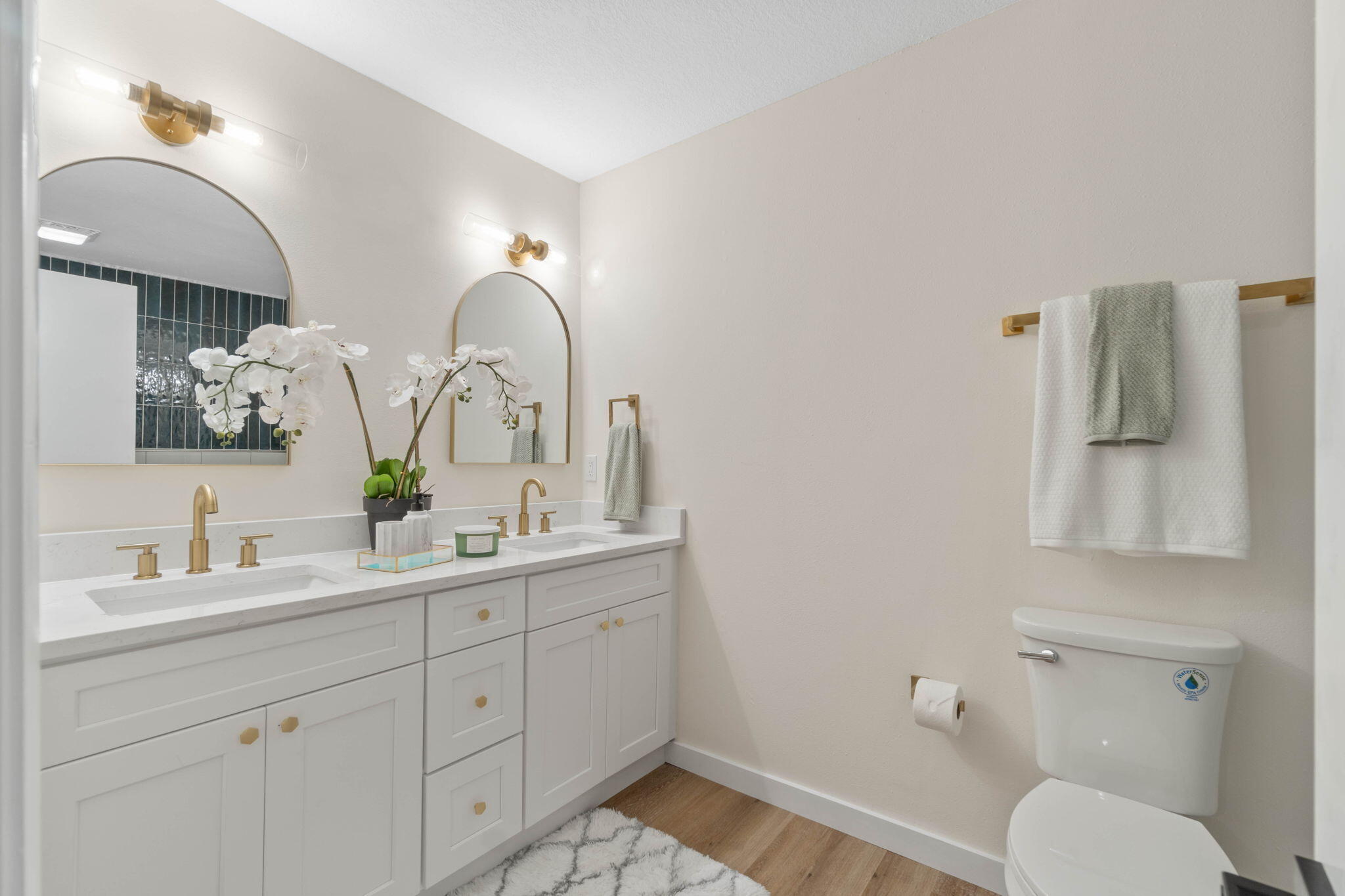 2313 Canal Drive Niceville, FL 32578 - Photo 26 of 52 a bathroom with a toilet sink and mirror
