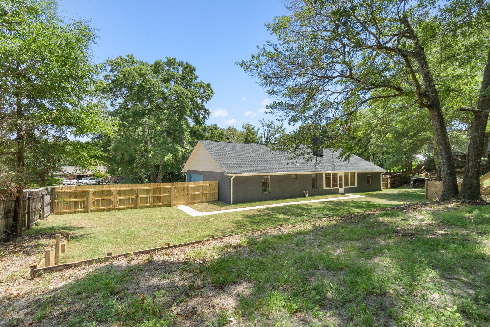 2313 Canal Drive Niceville, FL 32578 - Photo 40 of 52 front view of a house with a yard