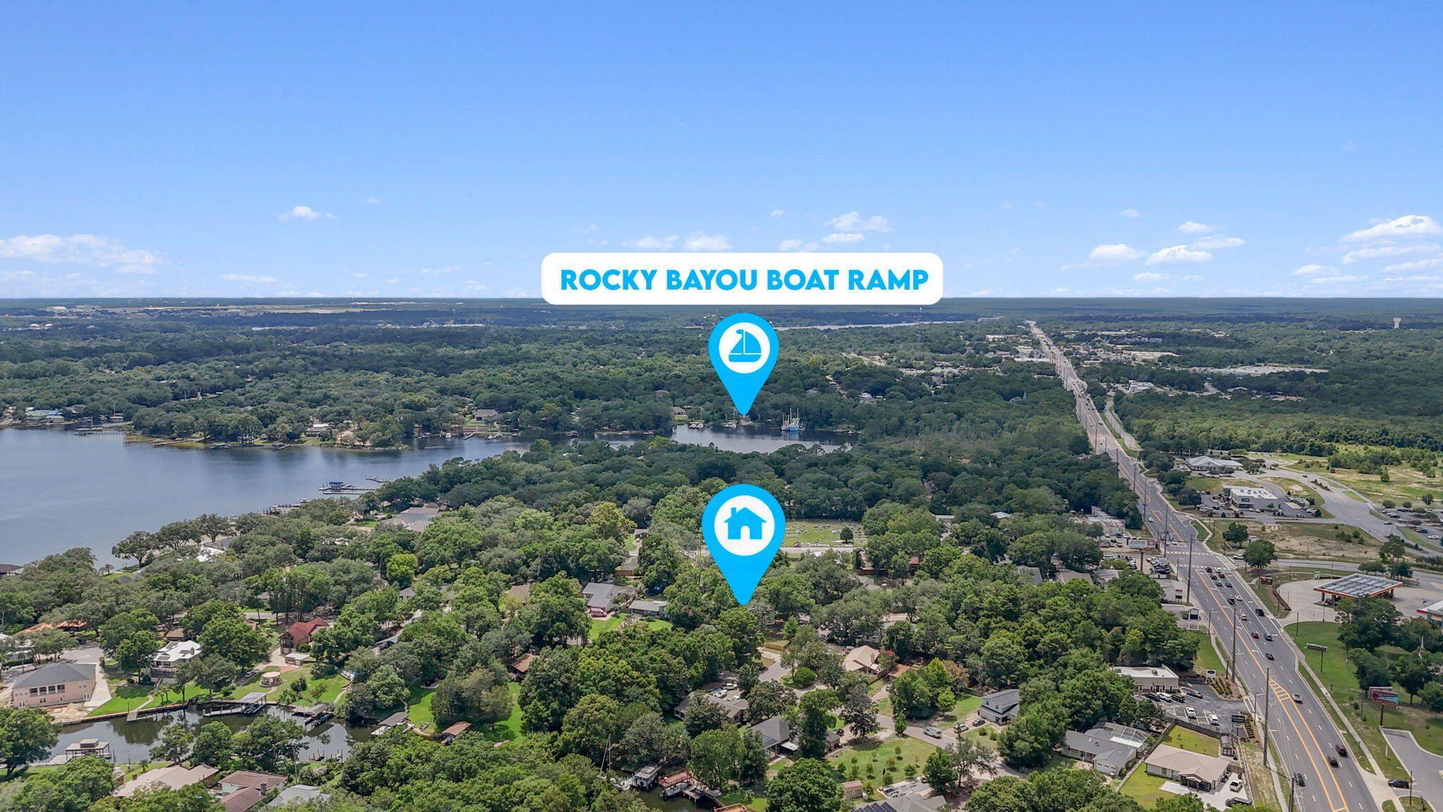 2313 Canal Drive Niceville, FL 32578 - Photo 50 of 52 a street view with tall trees