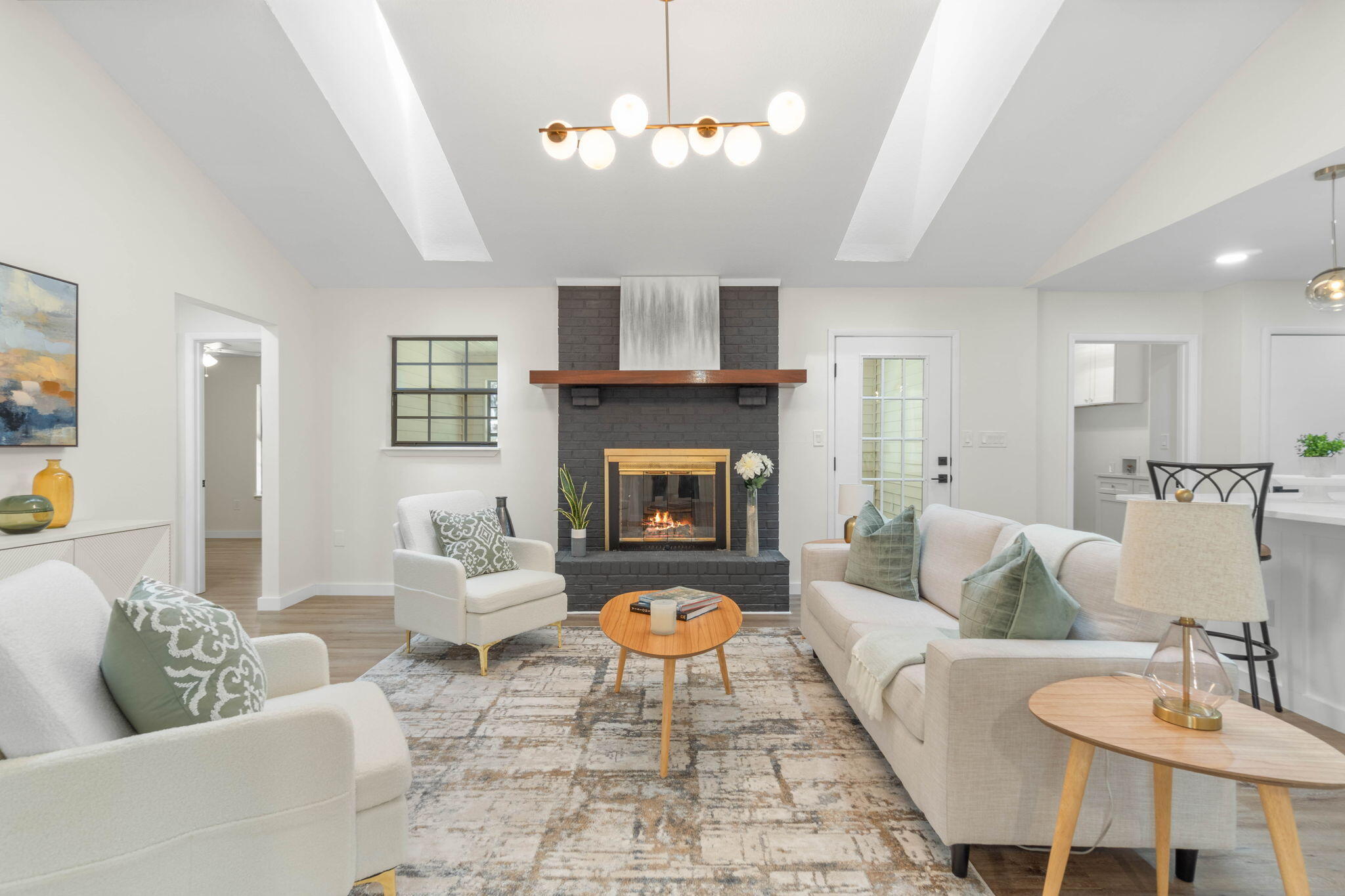 2313 Canal Drive Niceville, FL 32578 - Photo 7 of 52 a living room with furniture and a fireplace