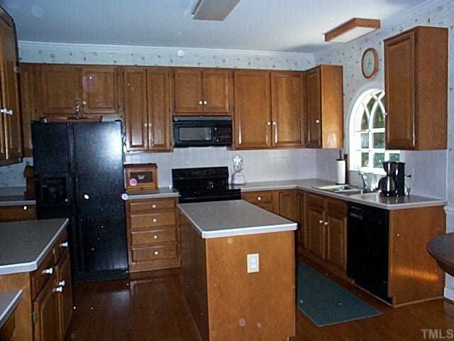 824 Reading Circle Raleigh, NC 27615 - Photo 5 of 12 LARGE KITCHEN WITH ISLAND AND DESK AREA