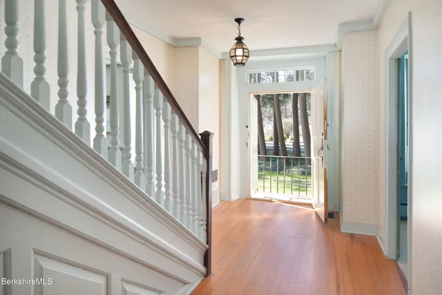 a view of living room with furniture and window