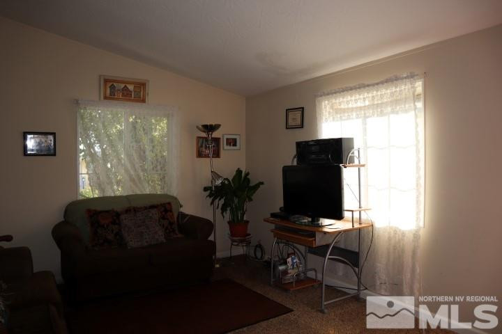 2183 Barberry Way Reno, NV 89512 - Photo 5 of 17 a living room with furniture and a window