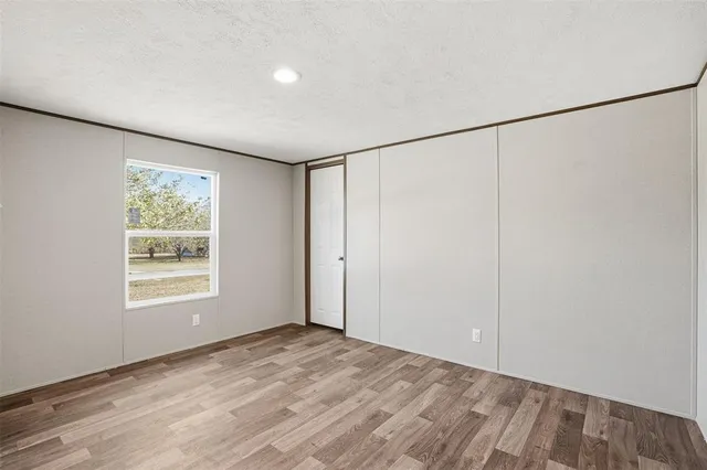 a view of a room that has a window in it