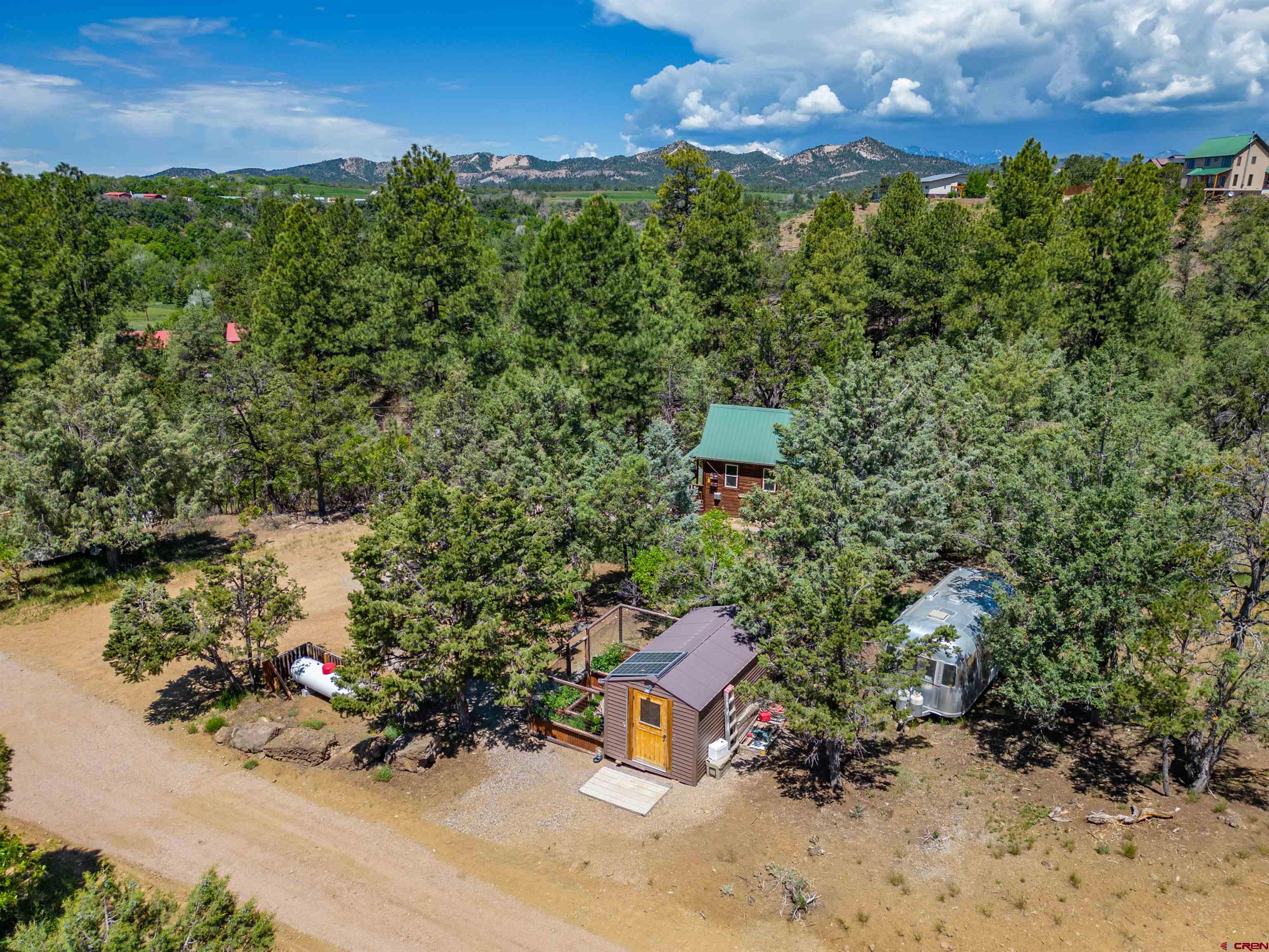 10 Alpine Drive Durango, CO 81301 - Photo 19 of 24 an aerial view of a house with a yard basket ball court and outdoor seating