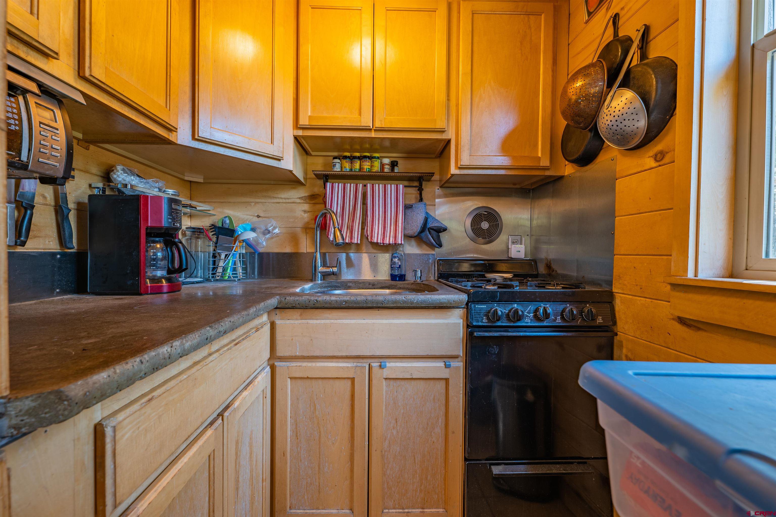 10 Alpine Drive Durango, CO 81301 - Photo 5 of 24 a kitchen with a stove and a sink