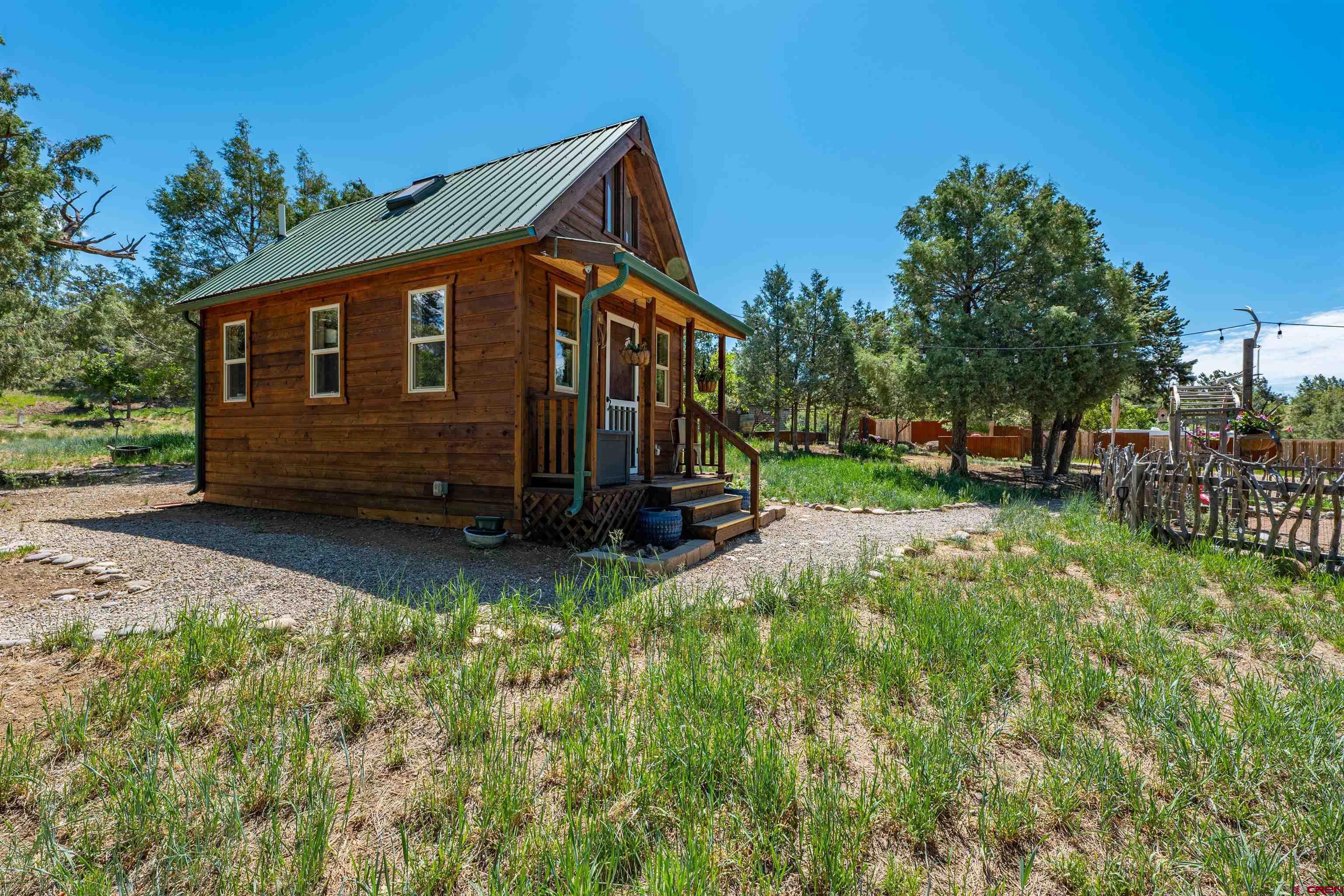 10 Alpine Drive Durango, CO 81301 - Photo 10 of 24 a view of a house with backyard and sitting area