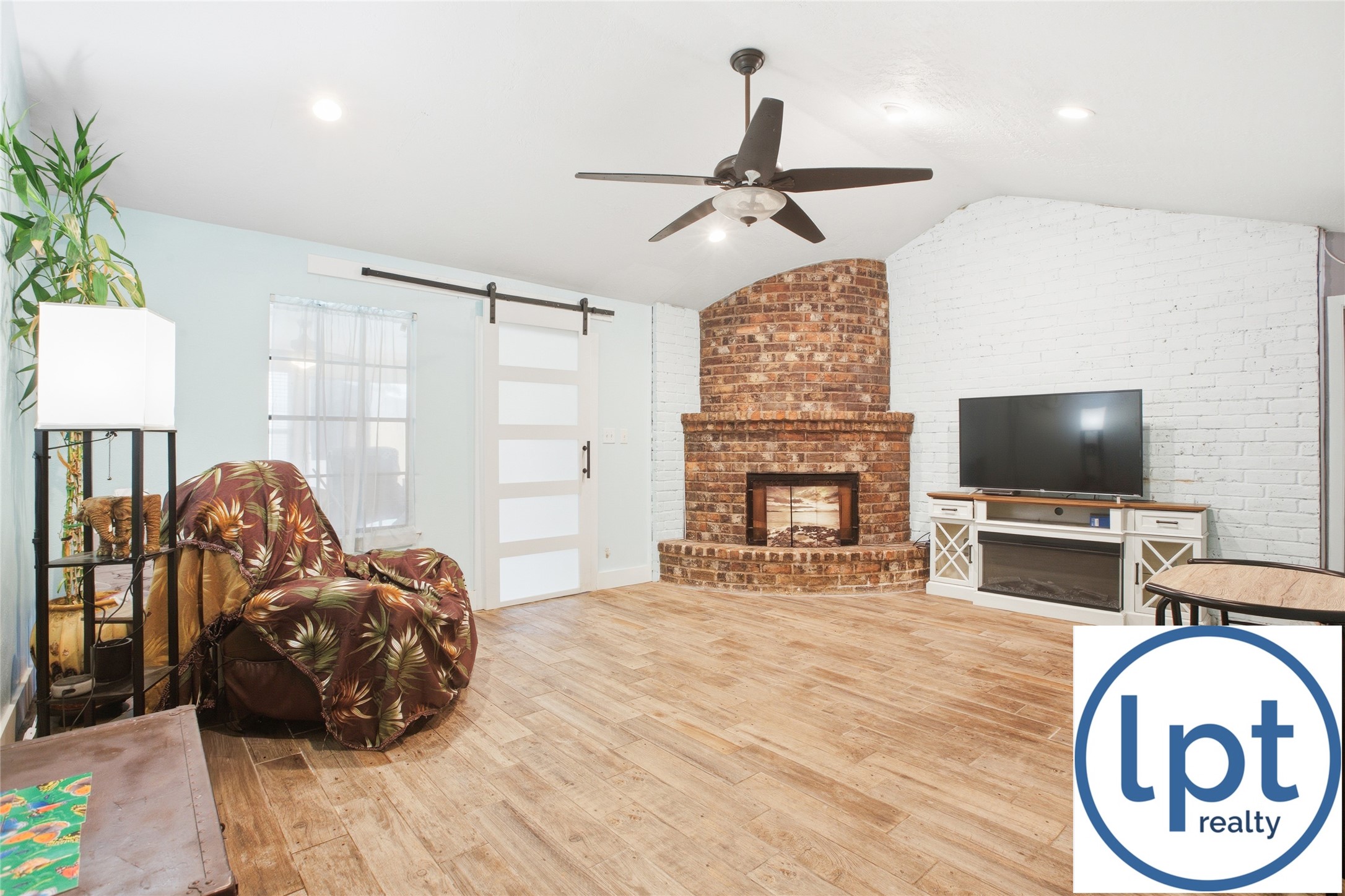 29011 Binefield Street Spring, TX 77386 - Photo 15 of 40 a bedroom with a bed and a flat screen tv