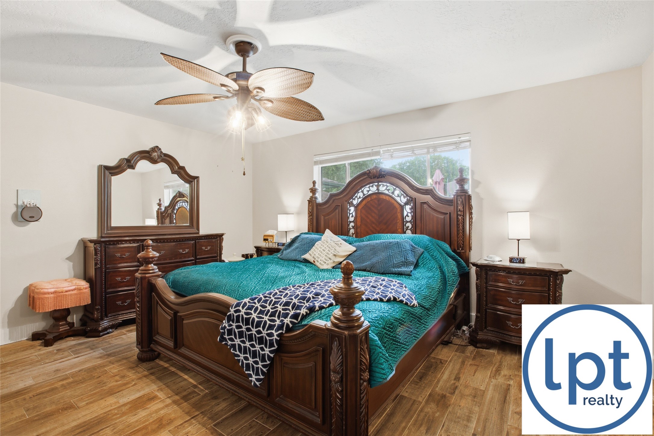 29011 Binefield Street Spring, TX 77386 - Photo 20 of 40 a bedroom with a bed and dresser