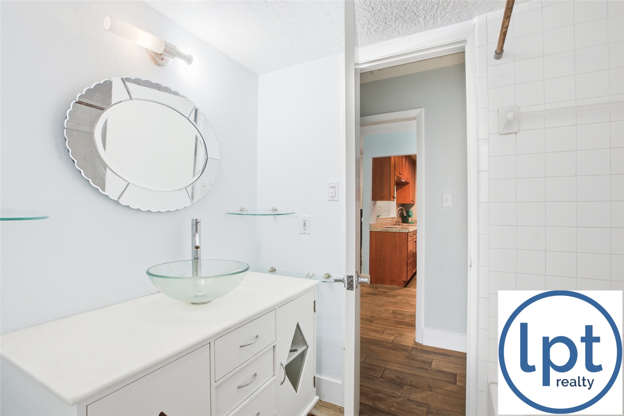 29011 Binefield Street Spring, TX 77386 - Photo 28 of 40 a bathroom with a sink and a mirror