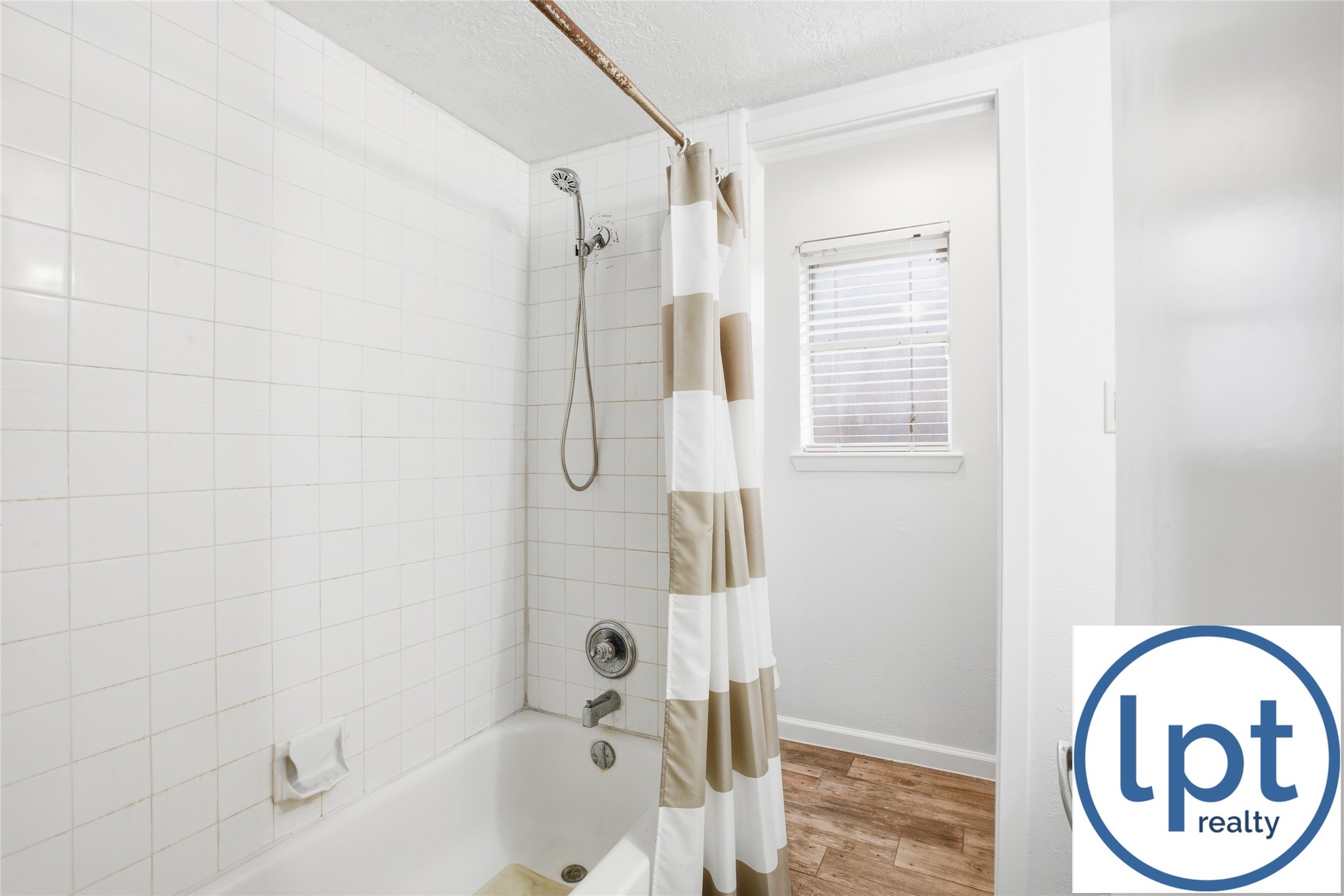 29011 Binefield Street Spring, TX 77386 - Photo 29 of 40 a bathroom with a bathtub a shower and a sink