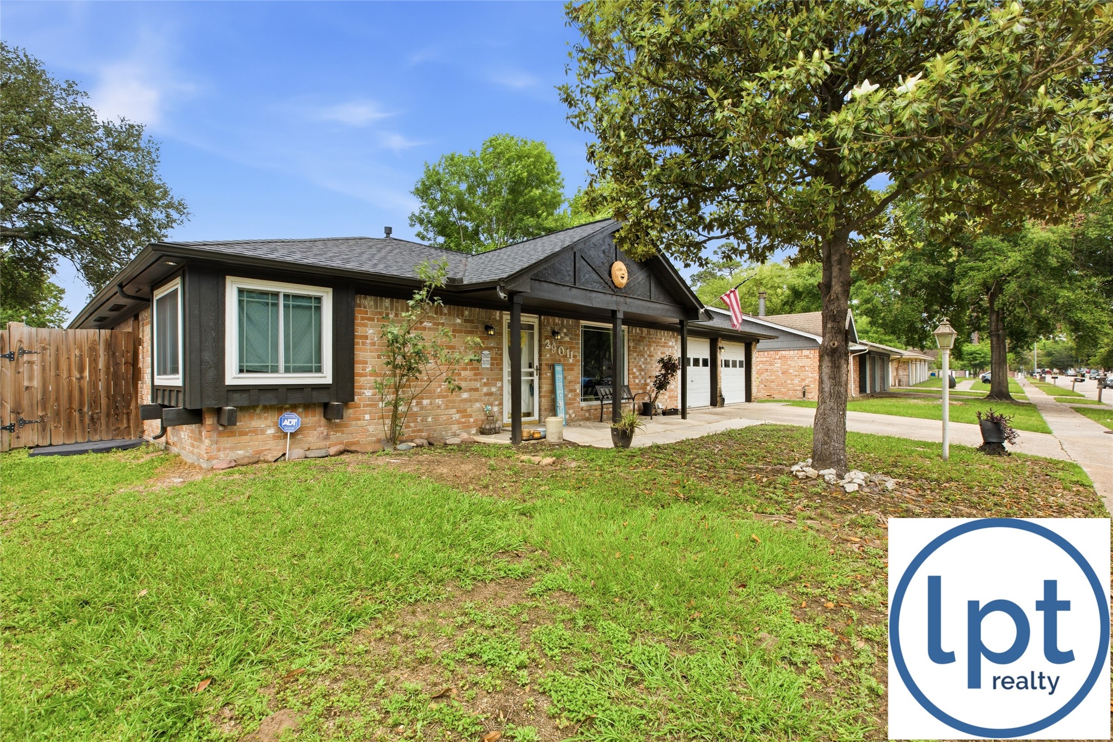 29011 Binefield Street Spring, TX 77386 - Photo 3 of 40 a front view of a house with garden
