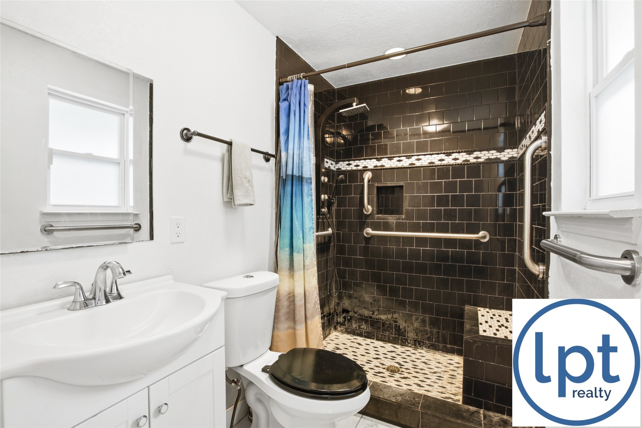 29011 Binefield Street Spring, TX 77386 - Photo 32 of 40 a bathroom with a sink a toilet and a shower