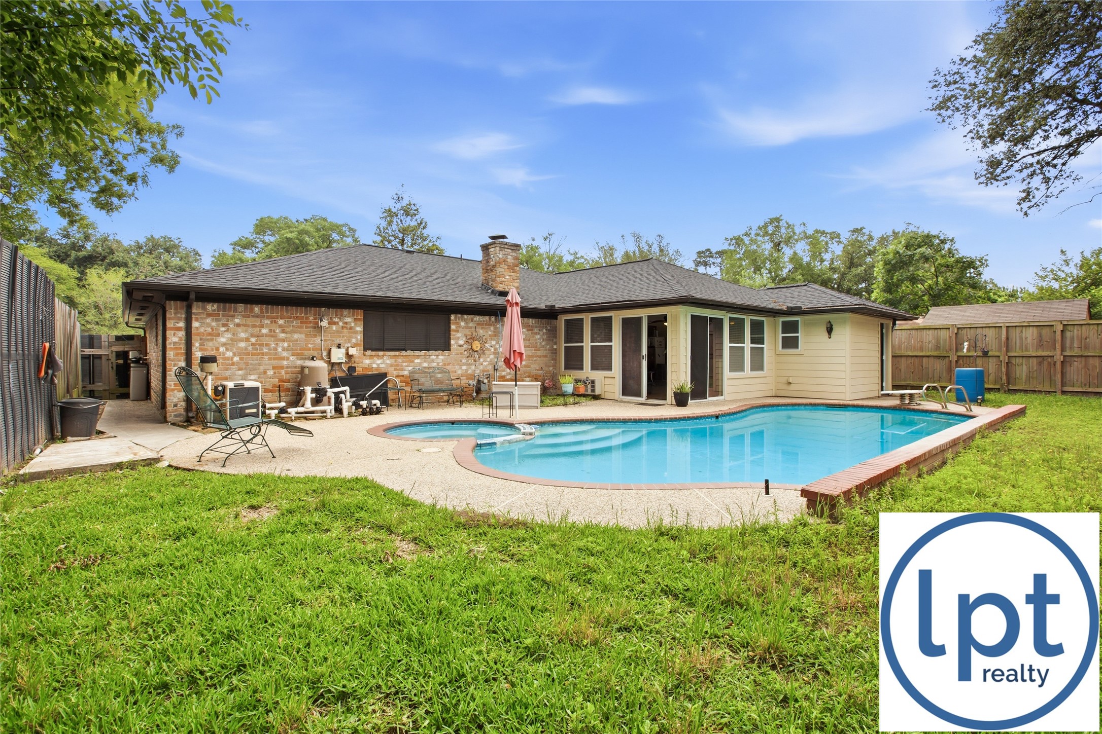 29011 Binefield Street Spring, TX 77386 - Photo 35 of 40 a view of a house with pool and a yard