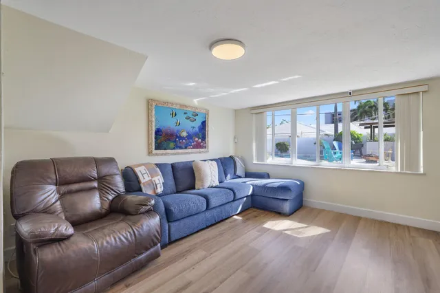 a bathroom with a tub and shower