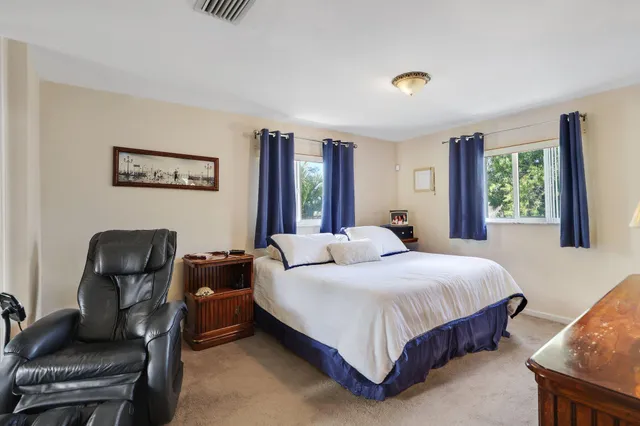 a view of a house with swimming pool