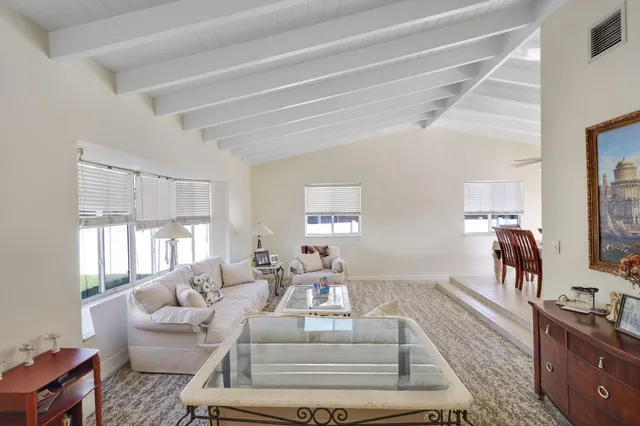 a kitchen with stainless steel appliances granite countertop a stove and cabinets