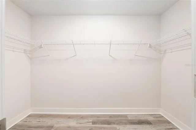 a view of room with stairs and a window