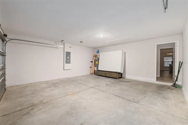 an aerial view of a house with a swimming pool
