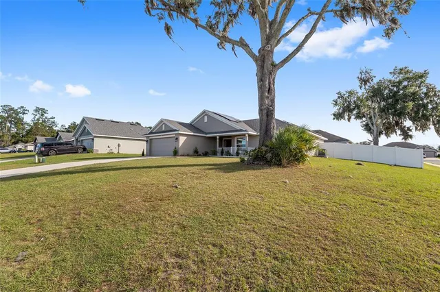 front view of the house with potted plants