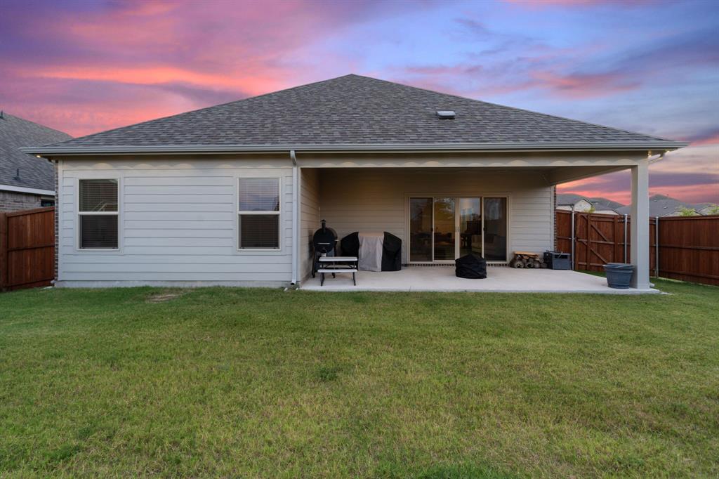 2232 Sun Star Drive Haslet, TX 76052 - Photo 13 of 40 a view of a house with a backyard