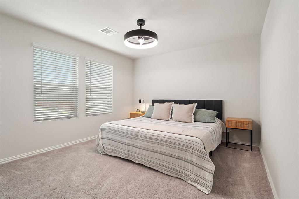 2232 Sun Star Drive Haslet, TX 76052 - Photo 27 of 40 a bedroom with a bed and a window