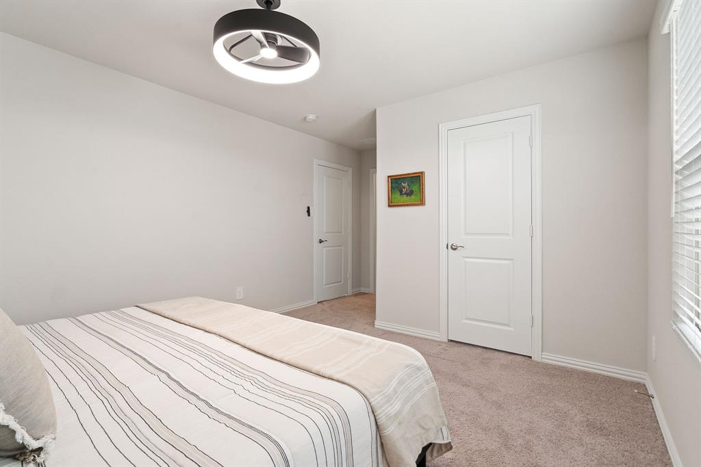 2232 Sun Star Drive Haslet, TX 76052 - Photo 28 of 40 a bedroom with a bed and a window