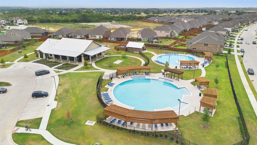 2232 Sun Star Drive Haslet, TX 76052 - Photo 39 of 40 an aerial view of a swimming pool with outdoor seating and yard