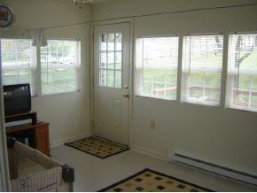 212 Buckboard Road Waynesboro, VA 22980 - Photo 11 of 12 a room with window and a flat screen tv