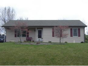 212 Buckboard Road Waynesboro, VA 22980 - Photo 2 of 12 a backyard of a house with table and chairs