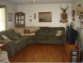 212 Buckboard Road Waynesboro, VA 22980 - Photo 6 of 12 a living room with furniture and a flat screen tv