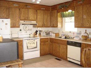 212 Buckboard Road Waynesboro, VA 22980 - Photo 7 of 12 a kitchen with stainless steel appliances granite countertop a sink a stove and cabinets