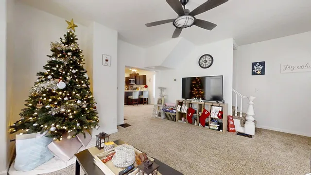 a view of a room with furniture and toys