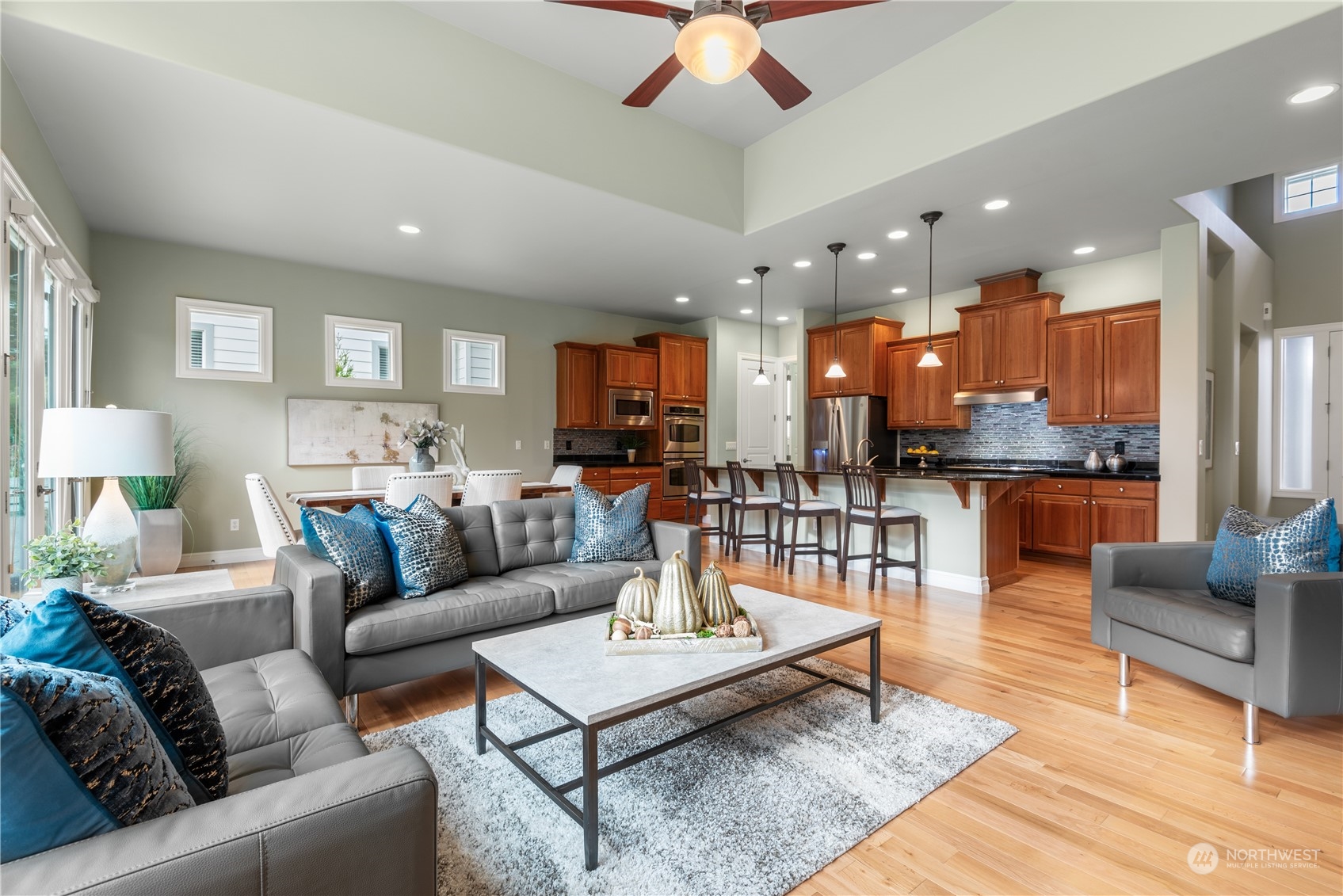 23923 Northeast Adair Road Redmond, WA 98053 - Photo 11 of 38 a living room with furniture and kitchen view